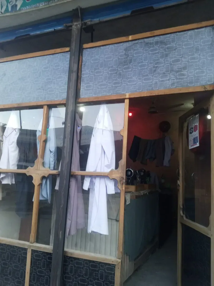 New Well Dress Tailoring House Chitral